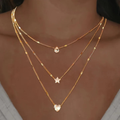 MÓNICA | COLLAR MULTICAPA CON DIJES DE CRISTAL